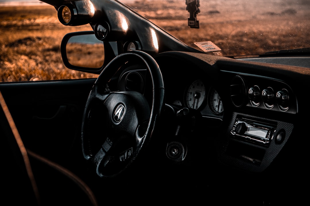 the dashboard of a car with a view of the desert